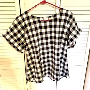 Boxy black and white checked blouse